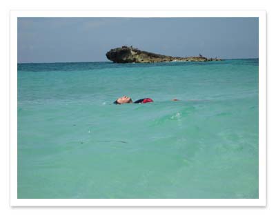 floating in the ocean at beautiful Tulum Mexico